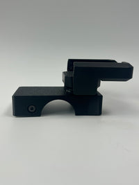 Side profile picture of a black crazy cart XL phone mount on a white background. 