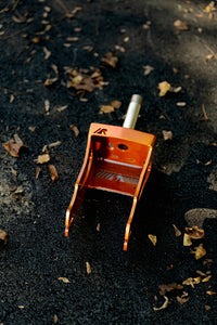 Bronze rdelta crazy cart fork on asphalt background 