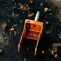Bronze RDelta crazy cart fork on asphalt.